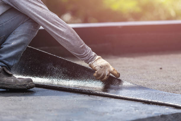 Professional Waterproofing technician working in Springfield, MI